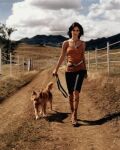 Fashion photo by Greger Norrevik, model walking a dog.