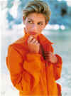 Fashion photo by Greger Norrevik, featuring an orange-themed outfit.